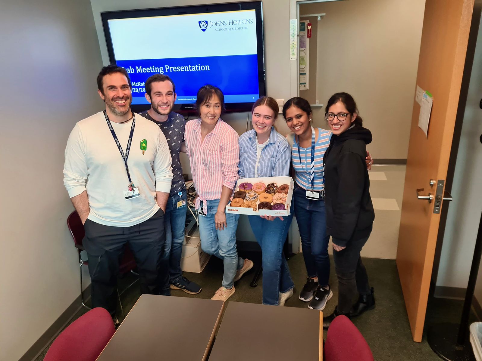 Lab meeting with donuts